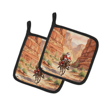 Load image into Gallery viewer, Santa Claus in the Desert Canyon Christmas Pair of Pot Holders