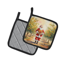 Load image into Gallery viewer, Santa Claus in the Orange Grove Christmas Pair of Pot Holders