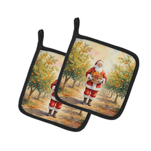 Load image into Gallery viewer, Santa Claus in the Orange Grove Christmas Pair of Pot Holders