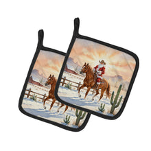 Load image into Gallery viewer, Santa Claus on Horseback at the Ranch Christmas Pair of Pot Holders