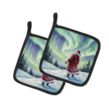 Load image into Gallery viewer, Santa Claus Watching the Northern Lights Christmas Pair of Pot Holders