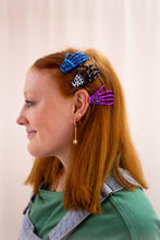 Load image into Gallery viewer, Ghastly Grasp Colorful Skeleton Hand Hair Clip