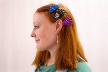 Load image into Gallery viewer, Ghastly Grasp Colorful Skeleton Hand Hair Clip
