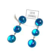 Load image into Gallery viewer, Blue Glow Tri Dot Donut Earrings