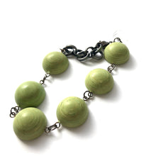 Load image into Gallery viewer, Peridot Green Matte Swirled Disc Stations Bracelet