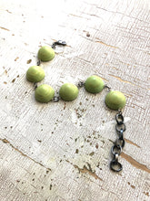 Load image into Gallery viewer, Peridot Green Matte Swirled Disc Stations Bracelet