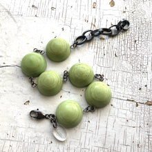 Load image into Gallery viewer, Peridot Green Matte Swirled Disc Stations Bracelet