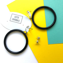 Load image into Gallery viewer, Clear &amp; Black Large Donut Drop Earrings