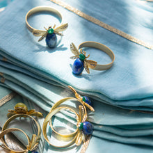 Load image into Gallery viewer, Etched wing bug skinny napkin rings, lapis lazuli, set of four