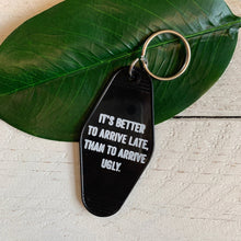 Load image into Gallery viewer, It's Better To Arrive Late, Than To Arrive Ugly Keychain in Black and White