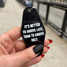 Load image into Gallery viewer, It's Better To Arrive Late, Than To Arrive Ugly Keychain in Black and White