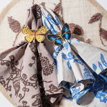 Load image into Gallery viewer, Painterly butterfly napkin rings, yellow, set of four