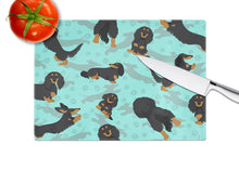 Load image into Gallery viewer, Longhaired Black Tan Dachshund Glass Cutting Boards – Durable, Decorative Kitchen Art Large