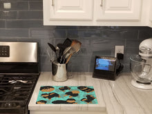 Load image into Gallery viewer, Black and Tan Pomeranian Glass Cutting Boards – Durable, Decorative Kitchen Art Large