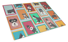 Load image into Gallery viewer, Lots of Black and Silver Schnauzer Glass Cutting Boards – Durable, Decorative Kitchen Art Large