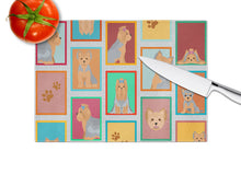 Load image into Gallery viewer, Lots of Blue and Tan Yorkie Glass Cutting Boards – Durable, Decorative Kitchen Art Large