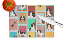 Load image into Gallery viewer, Lots of Tricolor Cavalier Spaniel Glass Cutting Boards – Durable, Decorative Kitchen Art Large