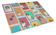 Load image into Gallery viewer, Lots of Blue Merle Sheltie Glass Cutting Boards – Durable, Decorative Kitchen Art Large