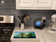 Load image into Gallery viewer, Cypress Tree in the Bayou Blue Glass Cutting Boards – Durable, Decorative Kitchen Art