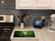 Load image into Gallery viewer, Heron On A Limb Glass Cutting Boards – Durable, Decorative Kitchen Art