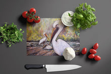 Load image into Gallery viewer, Three Pelicans on a Pier Glass Cutting Boards – Durable, Decorative Kitchen Art