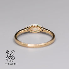 Load image into Gallery viewer, Minimalist Marquise Australian Solid Opal Diamond Engagement Ring 18K Yellow Gold.