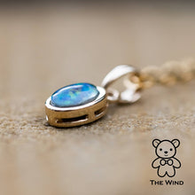 Load image into Gallery viewer, Oval Shaped Australian Triplet Opal Necklace in 14k Yellow Gold