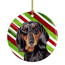 Load image into Gallery viewer, Dachshund Candy Cane Holiday Christmas  Ornament - Round Ceramic Ornament – Artist-Designed Keepsake Decoration SC9323