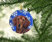 Load image into Gallery viewer, Dachshund Winter Snowflakes Holiday Ornament - Round Ceramic Ornament – Artist-Designed Keepsake Decoration SC9368
