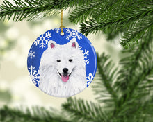 Load image into Gallery viewer, American Eskimo Winter Snowflakes Holiday Ornament - Round Ceramic Ornament – Artist-Designed Keepsake Decoration SC9379