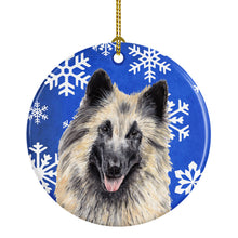 Load image into Gallery viewer, Belgian Tervuren Winter Snowflakes Holiday Ornament - Round Ceramic Ornament – Artist-Designed Keepsake Decoration SC9392