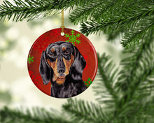 Load image into Gallery viewer, Dachshund Red Snowflakes Holiday Christmas Ornament - Round Ceramic Ornament – Artist-Designed Keepsake Decoration SC9403
