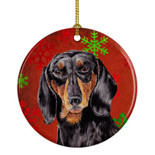 Load image into Gallery viewer, Dachshund Red Snowflakes Holiday Christmas Ornament - Round Ceramic Ornament – Artist-Designed Keepsake Decoration SC9403