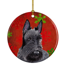 Load image into Gallery viewer, Scottish Terrier Red Snowflakes Holiday Christmas Ornament - Round Ceramic Ornament – Artist-Designed Keepsake Decoration SC9426