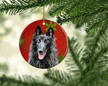 Load image into Gallery viewer, Belgian Sheepdog Red Snowflakes Holiday Christmas Ornament - Round Ceramic Ornament – Artist-Designed Keepsake Decoration SC9438