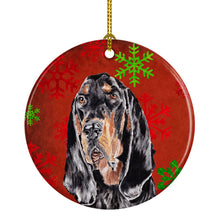 Load image into Gallery viewer, Black and Tan Coonhound Red Snowflakes Holiday Ceramic Ornament SC9581CO1
