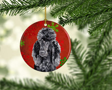 Load image into Gallery viewer, Black Standard Poodle Red Snowflakes Holiday Ornament - Round Ceramic Ornament – Artist-Designed Keepsake Decoration SC9746CO1