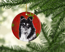 Load image into Gallery viewer, Black and White Collie Red Snowflakes Holiday Ornament - Round Ceramic Ornament – Artist-Designed Keepsake Decoration SC9750CO1