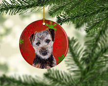 Load image into Gallery viewer, Norfolk Terrier Puppy Red Snowflakes Holiday Ornament - Round Ceramic Ornament – Artist-Designed Keepsake Decoration SC9759CO1