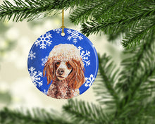 Load image into Gallery viewer, Red Miniature Poodle Winter Snowflakes Ornament - Round Ceramic Ornament – Artist-Designed Keepsake Decoration SC9771CO1