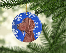 Load image into Gallery viewer, Redbone Coonhound Winter Snowflakes Ornament - Round Ceramic Ornament – Artist-Designed Keepsake Decoration SC9779CO1