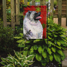 Load image into Gallery viewer, Keeshond Red and Green Snowflakes Holiday Christmas Garden Flag – Decorative Outdoor Yard Flag