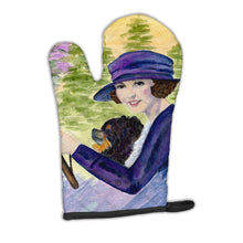 Load image into Gallery viewer, Lady driving with her Pomeranian Oven Mitt SS8538OVMT