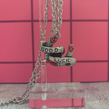 Load image into Gallery viewer, Sourpuss "Good Luck” Horseshoe Necklace with Red Rhinestones &amp; Black Star Charms