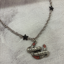 Load image into Gallery viewer, Sourpuss "Good Luck” Horseshoe Necklace with Red Rhinestones &amp; Black Star Charms
