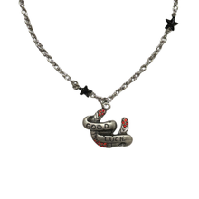 Load image into Gallery viewer, Sourpuss "Good Luck” Horseshoe Necklace with Red Rhinestones &amp; Black Star Charms