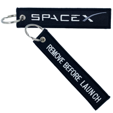 Load image into Gallery viewer, BLACK SpaceX REMOVE BEFORE LAUNCH Luggage Tag zipper pull keychain Space X CL4-06