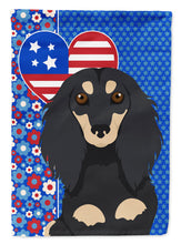 Load image into Gallery viewer, Longhair Black and Cream Dachshund Patriotic Heart Garden Flag – Red, White &amp; Blue Dog Decor with Star Background