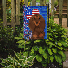 Load image into Gallery viewer, Longhair Chocolate and Tan Dachshund Patriotic Heart Garden Flag – Red, White &amp; Blue Dog Decor with Star Background