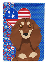Load image into Gallery viewer, Longhair Chocolate and Cream Dachshund Patriotic Heart Garden Flag – Red, White &amp; Blue Dog Decor with Star Background